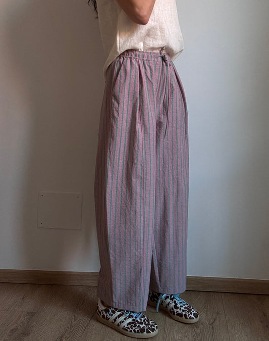 Pink baggy trousers with green stripes
