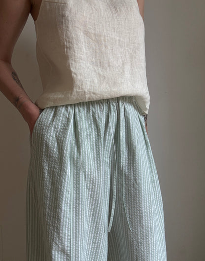 Green cotton trousers with milk stripes