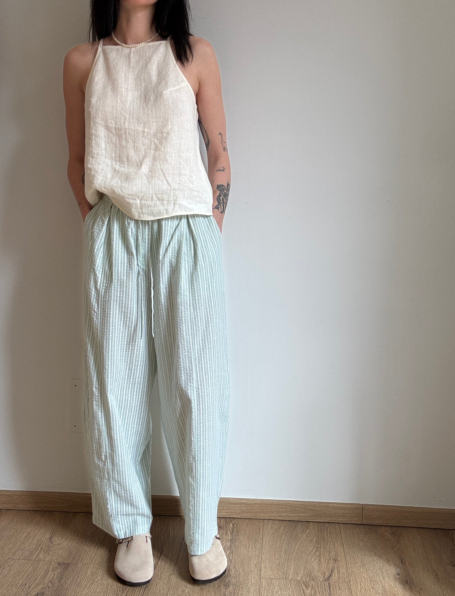 Green cotton trousers with milk stripes
