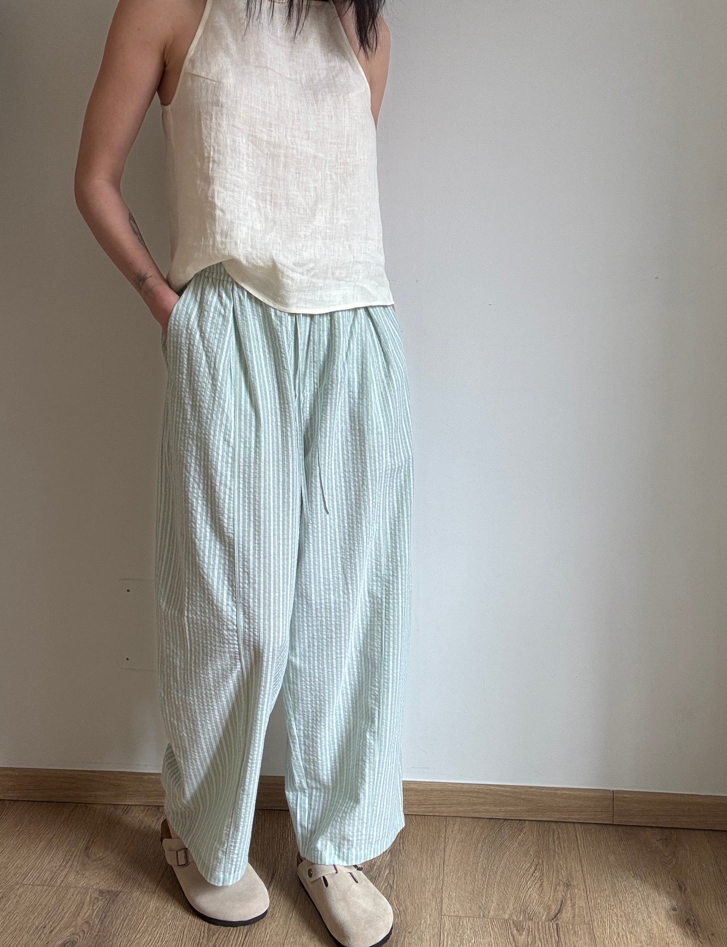 Green cotton trousers with milk stripes