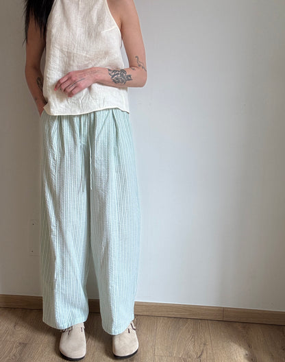 Green cotton trousers with milk stripes