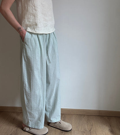 Green cotton trousers with milk stripes