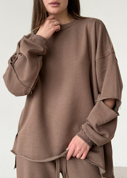 Brown cotton sweatshirt with a ripped elbow