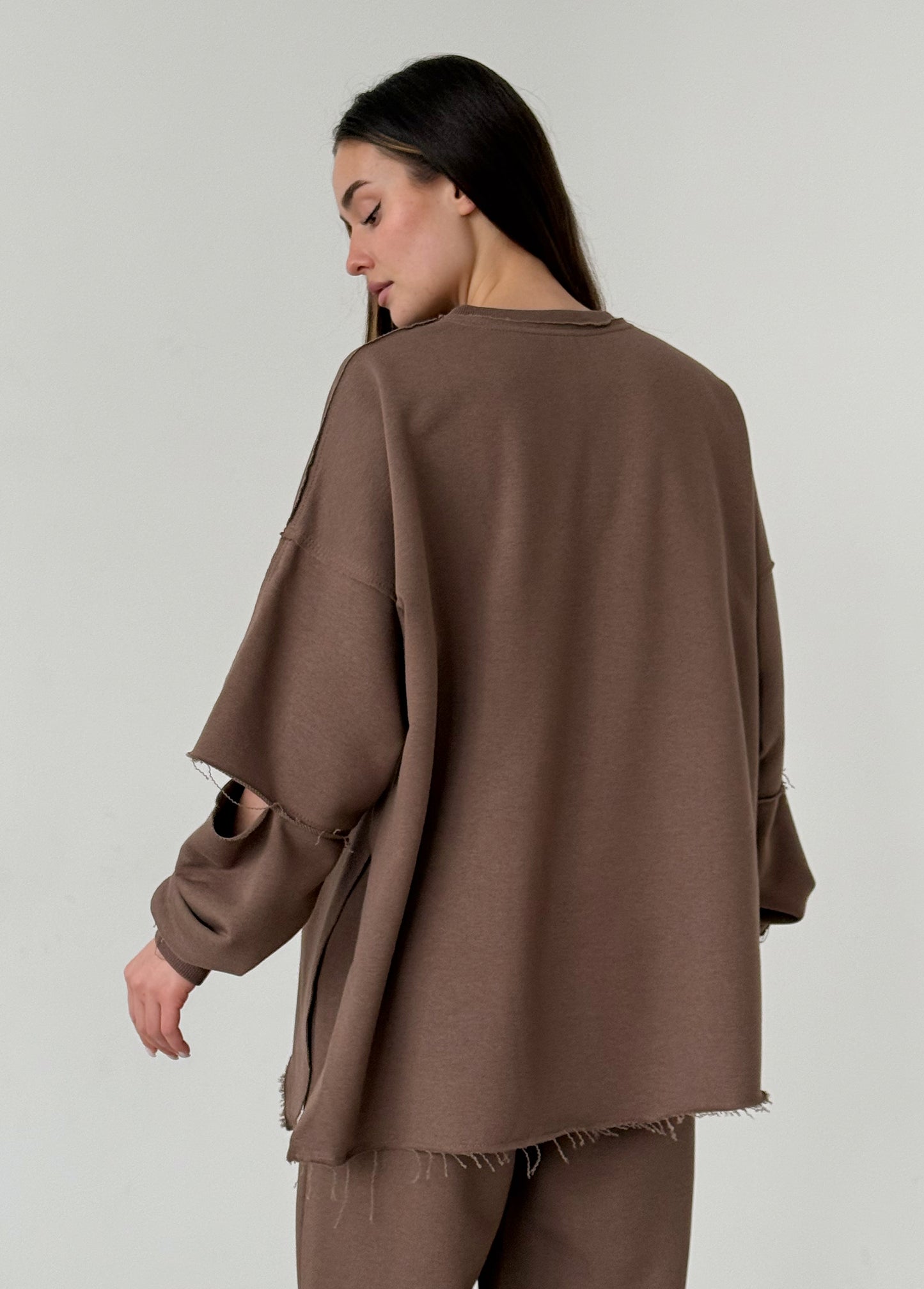 Brown cotton sweatshirt with a ripped elbow