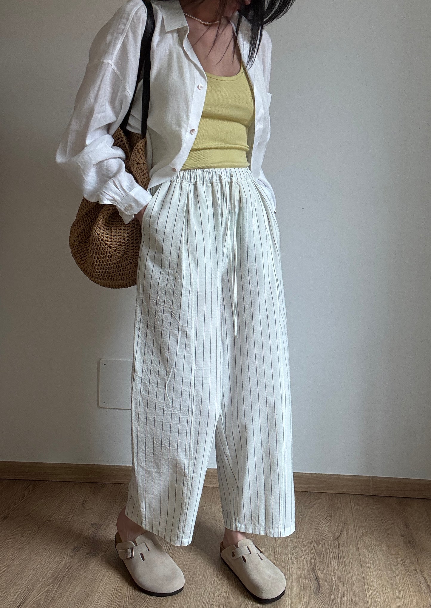 Milk cotton trousers with black stripes