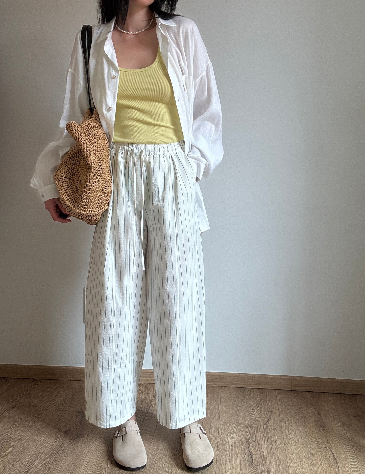 Milk cotton trousers with black stripes