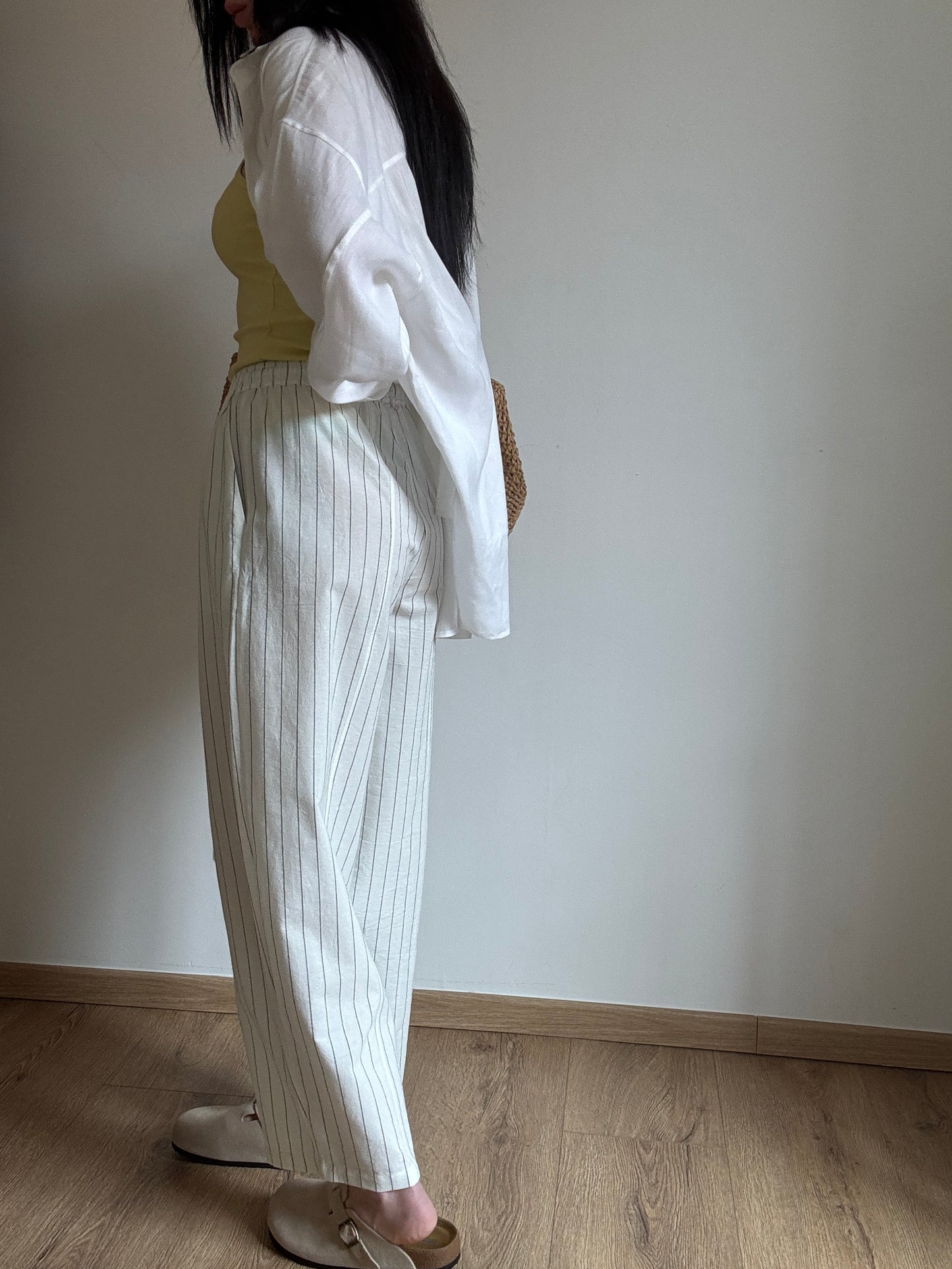 Milk cotton trousers with black stripes