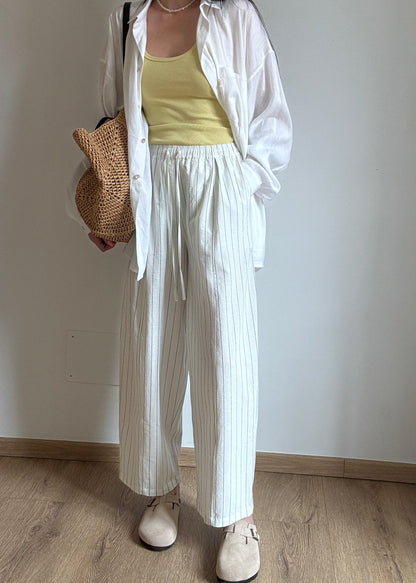 Milk cotton trousers with black stripes