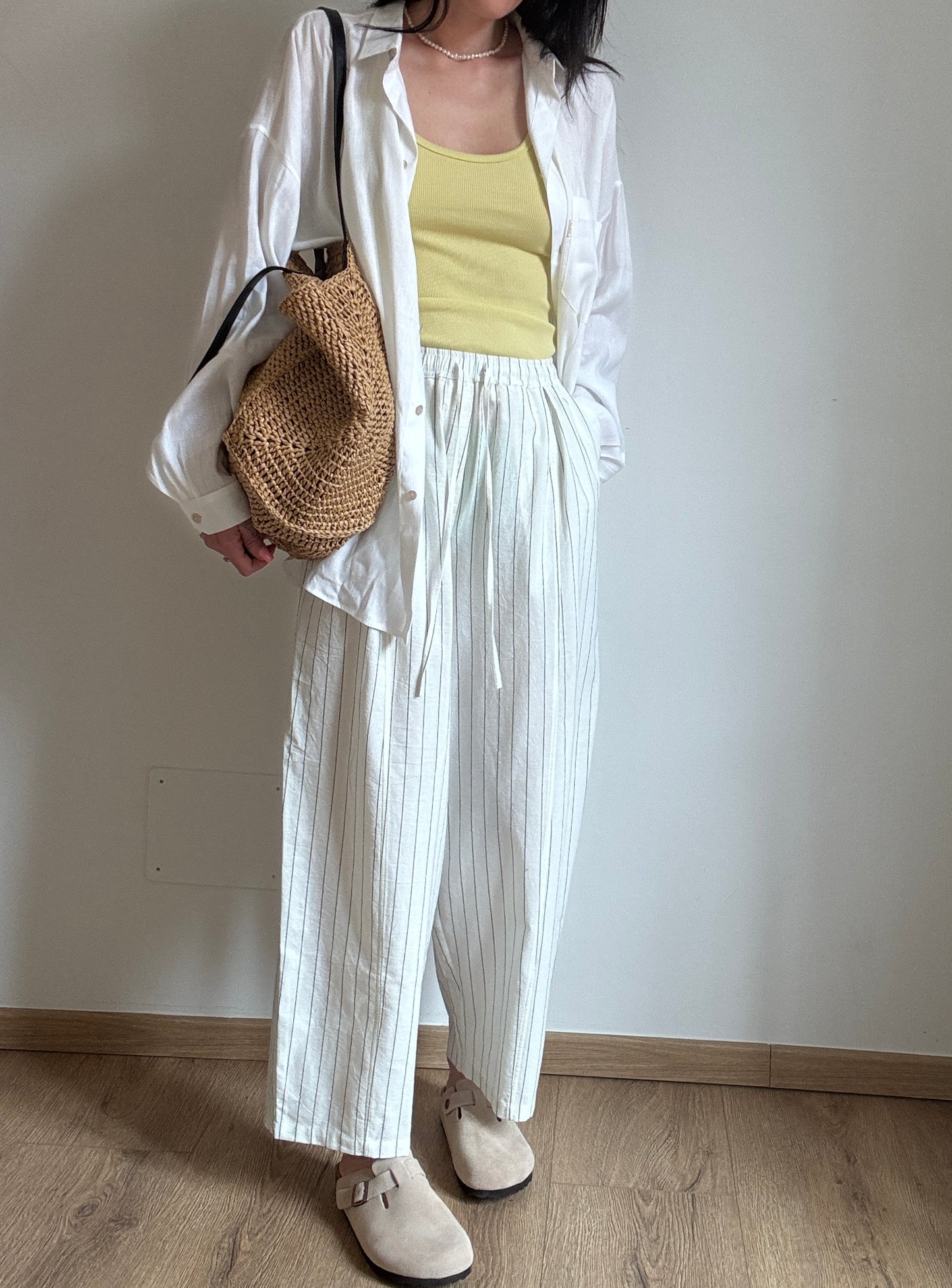 Milk cotton trousers with black stripes