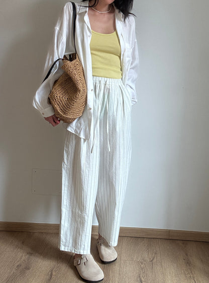 Milk cotton trousers with black stripes